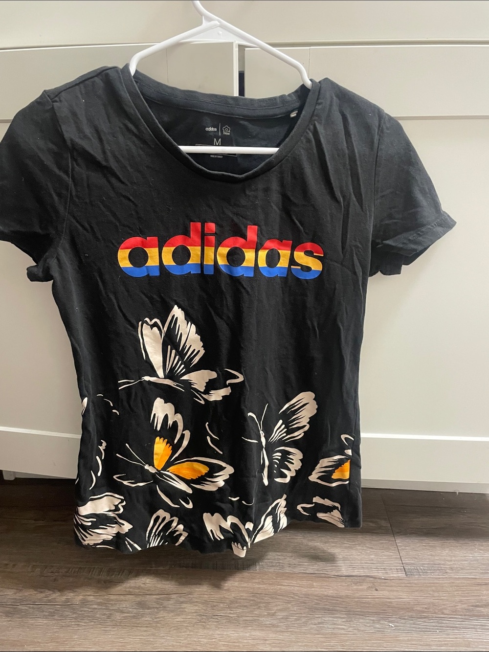 adidas Black Short-Sleeve Tee with Multicolor Logo & Butterfly Print
